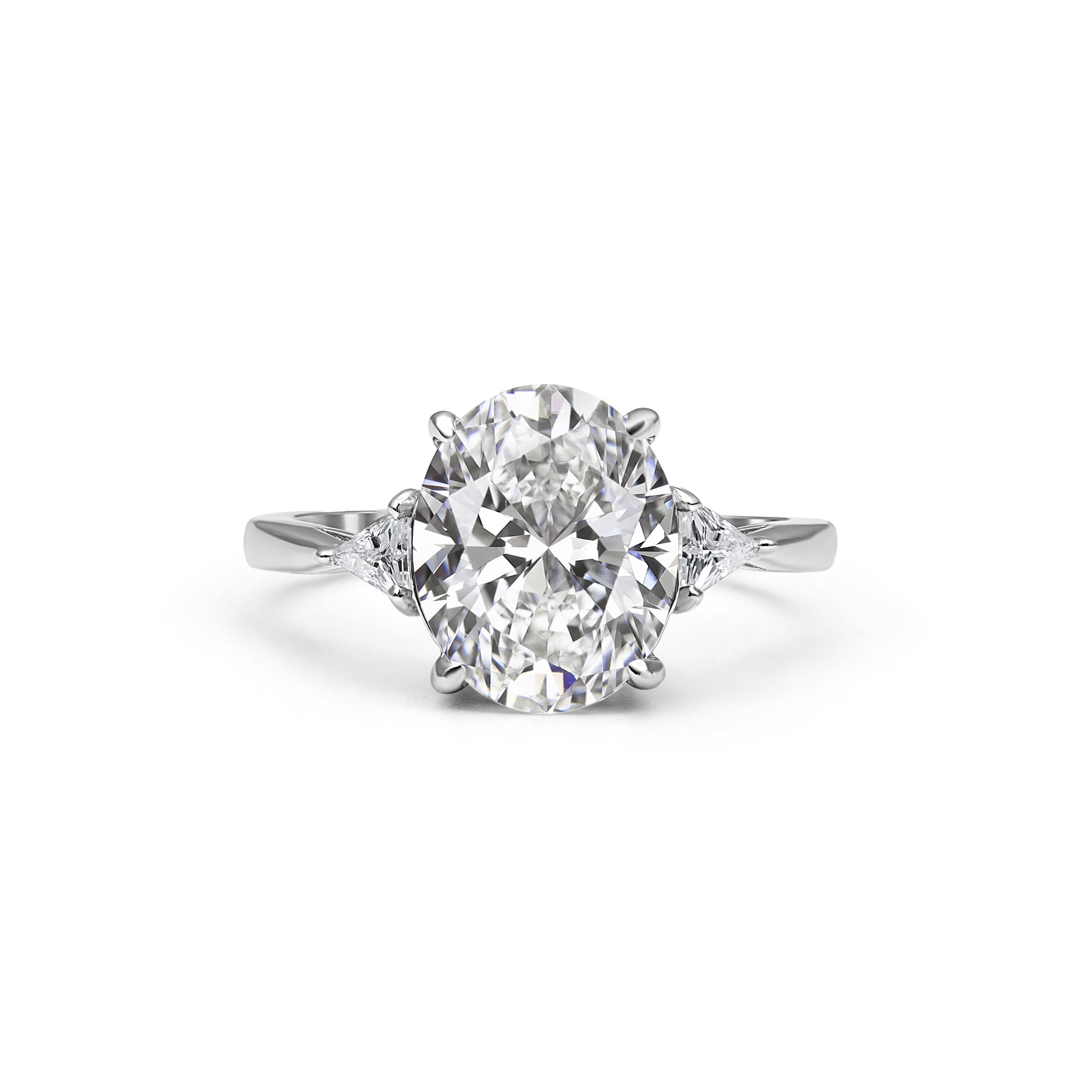 Tria Three Stone Oval Cut Moissanite Ring