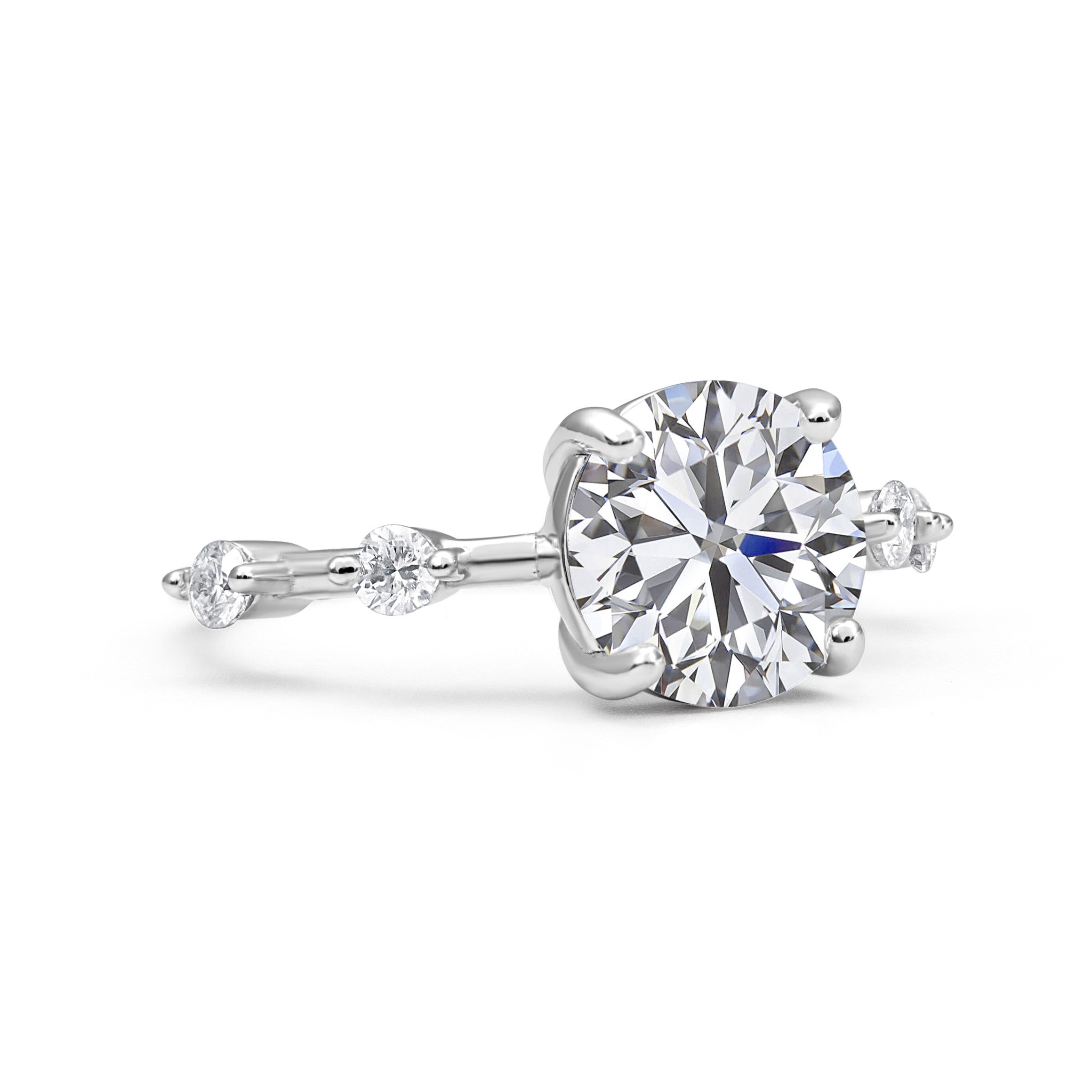 Petite Round Cut Moissanite Ring