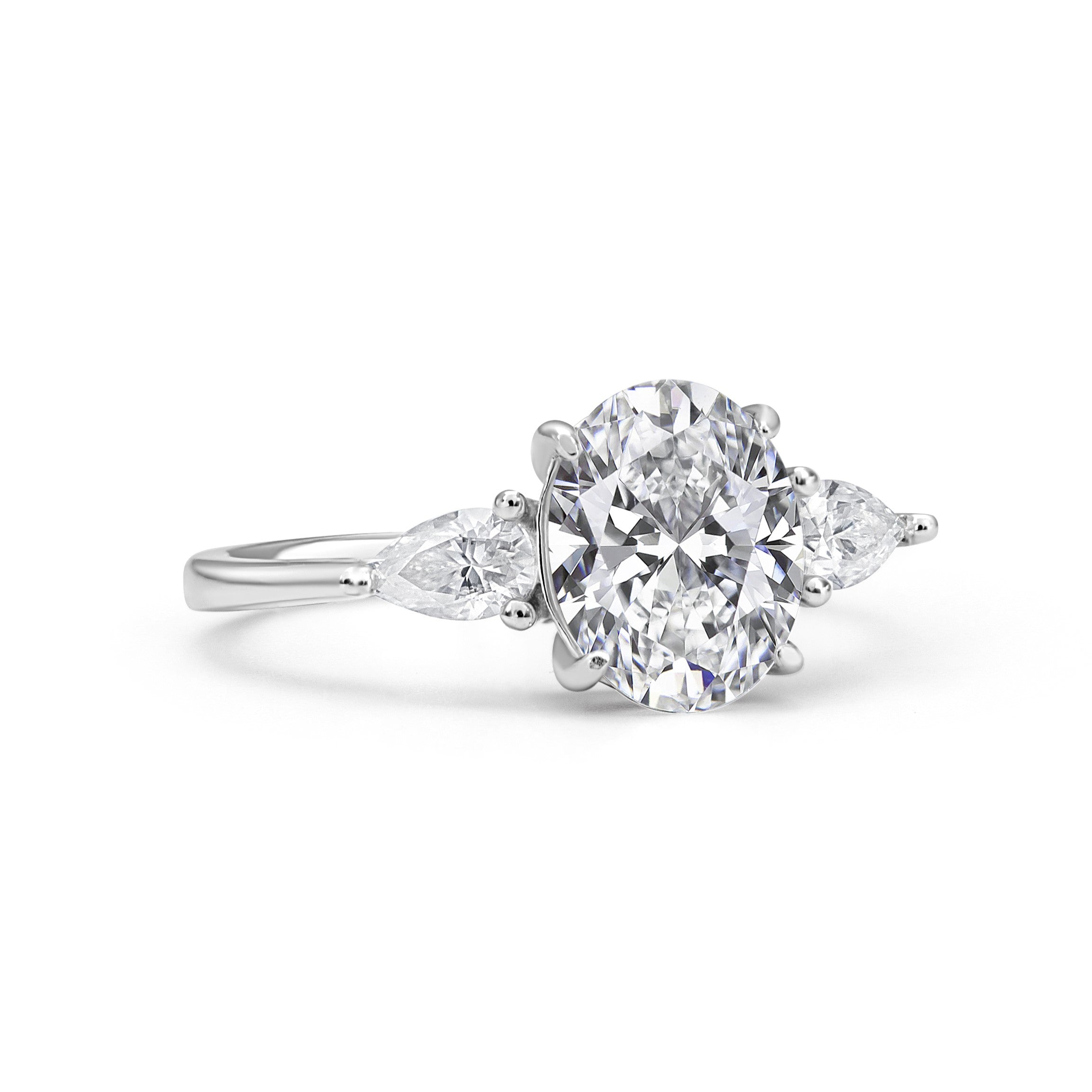 Three Stone Oval Cut Moissanite Ring