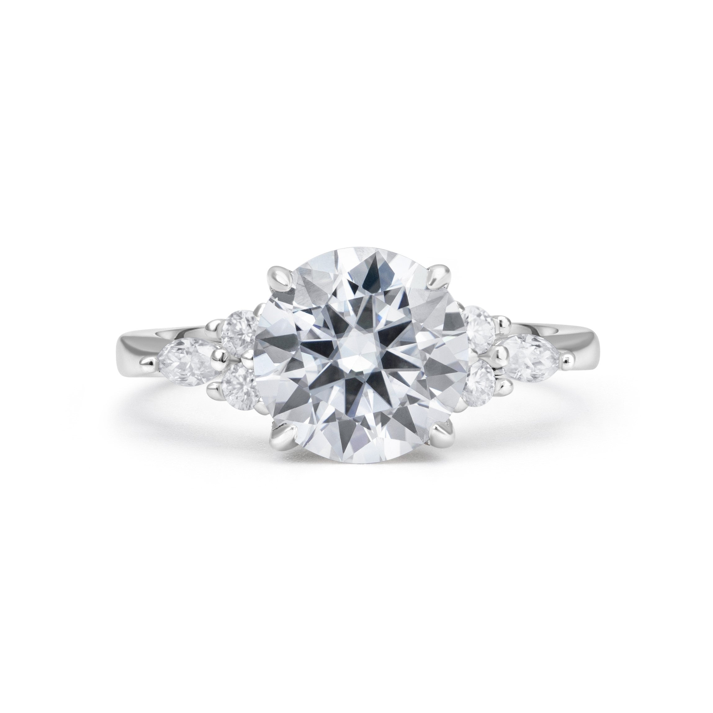 Luxe Three Stone Round Cut Moissanite Ring in Sterling Silver