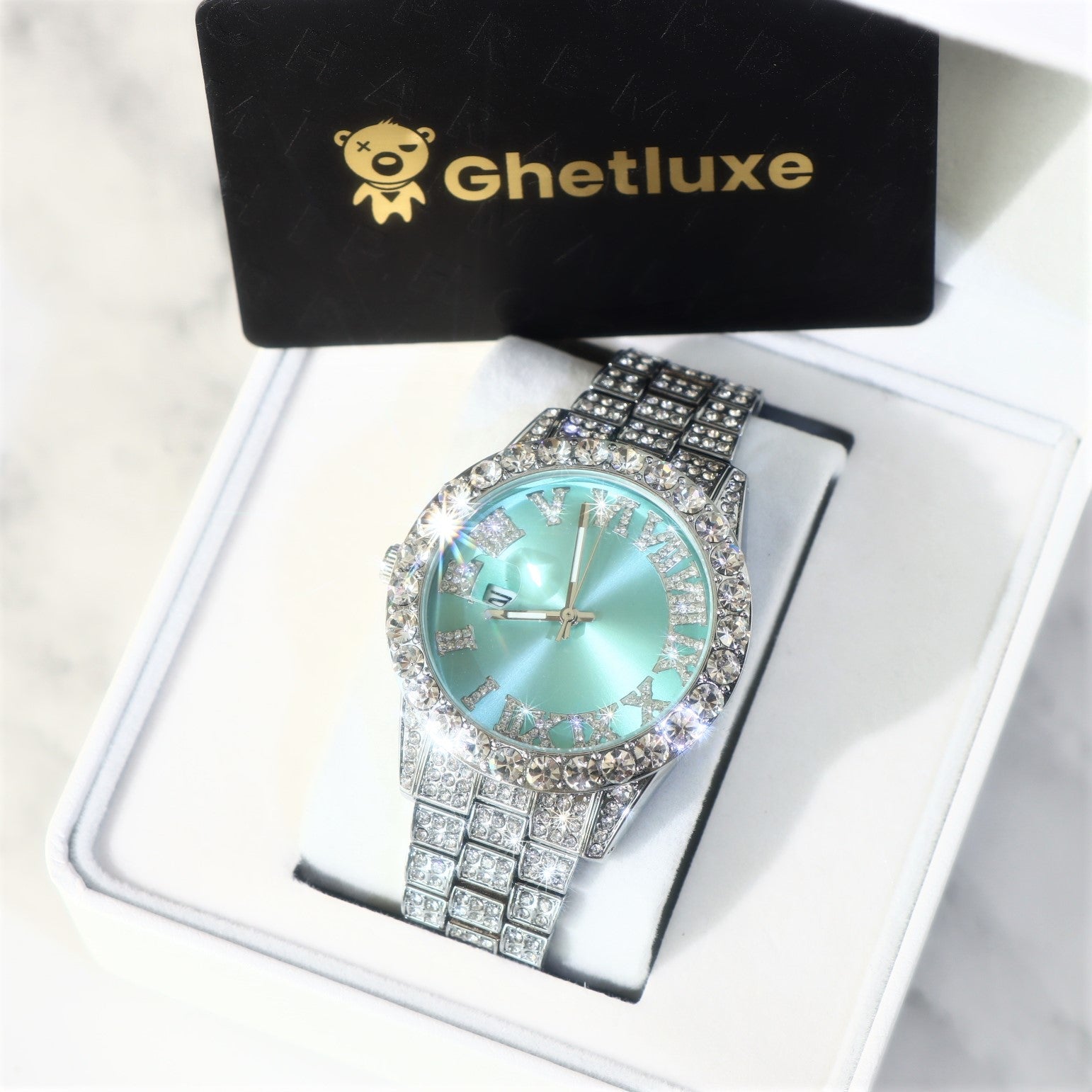 Women's Iced Watch with Roman Numerals Ice Blue Dial